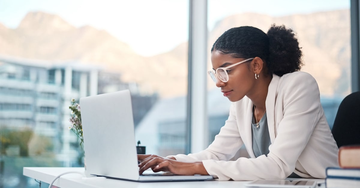 black woman searching for a professional email address generator